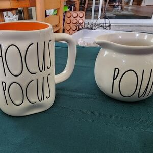 Rae dunn hocus pocus mug and pour on a pitcher